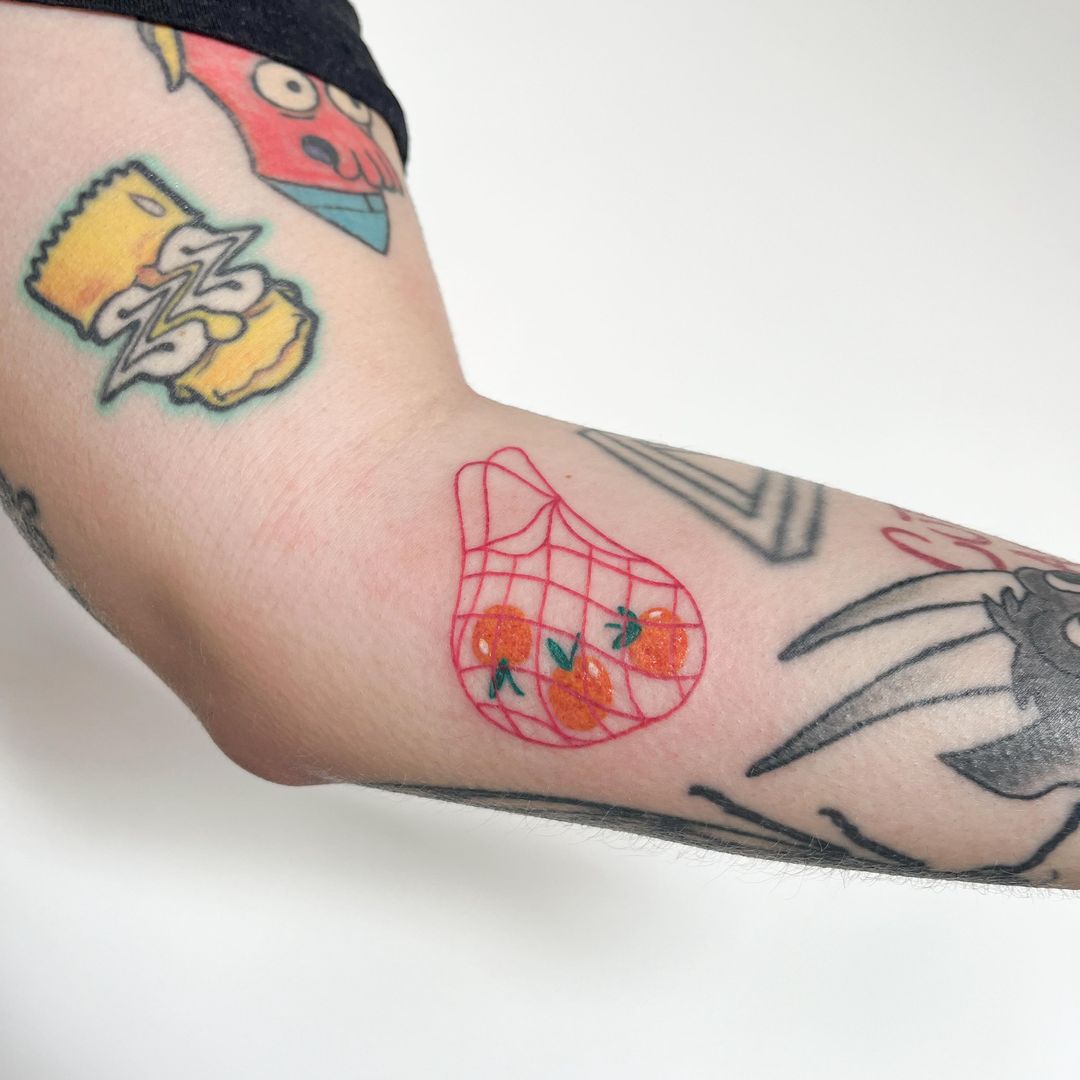 Tatouage par Tamagotchi Tattoo