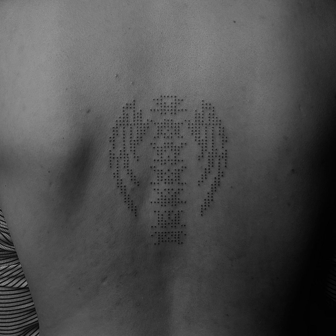Tatouage par Wolf