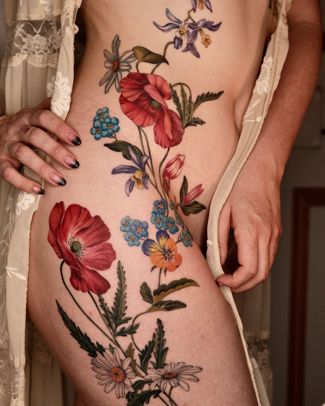 Tatouage par Yung Chi Ku Evennou