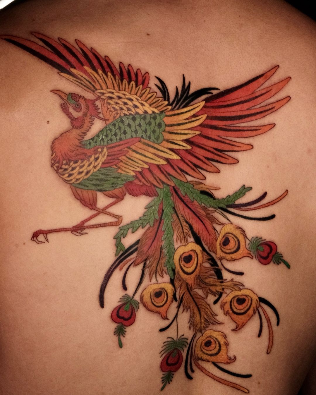 Tatouage par Yung Chi Ku Evennou