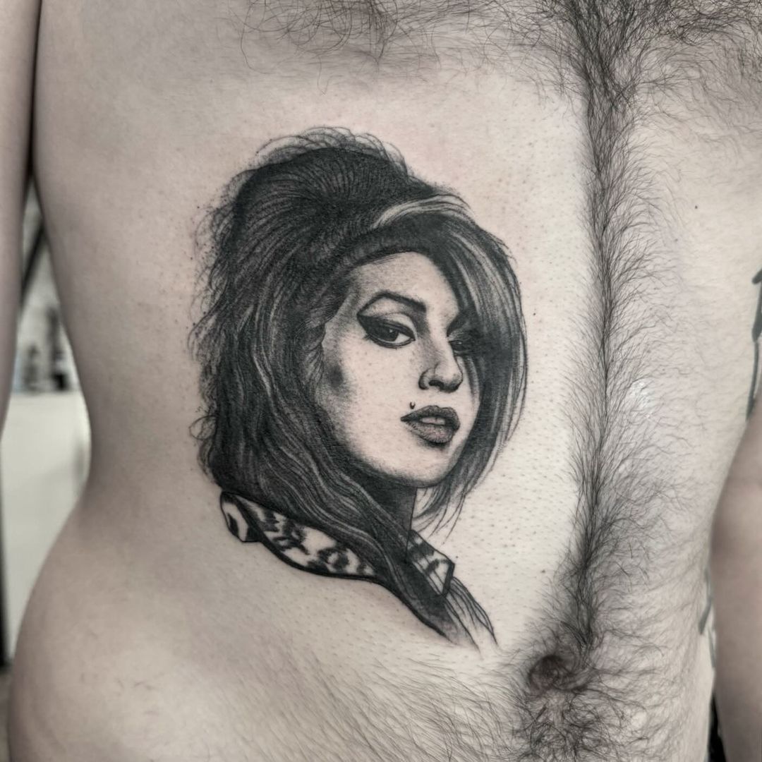Tatouage par Jimi Jugio