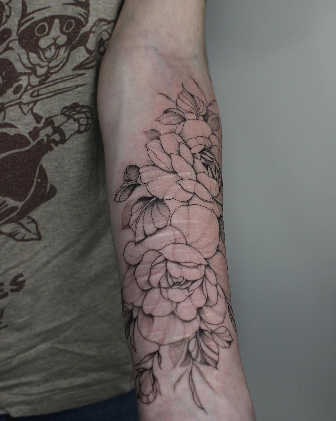Travail de Tatouage Floral Fin Angers