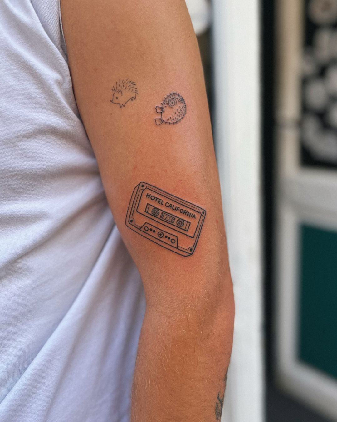 Tatouage par Grenz Tattoo Club