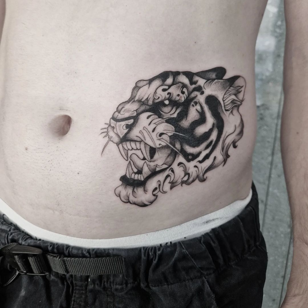 Tatouage par Divine Blackheart Tattoo