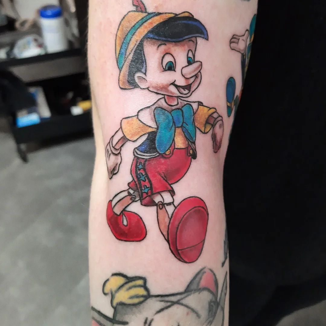 Tatouage par Erik Barrabes