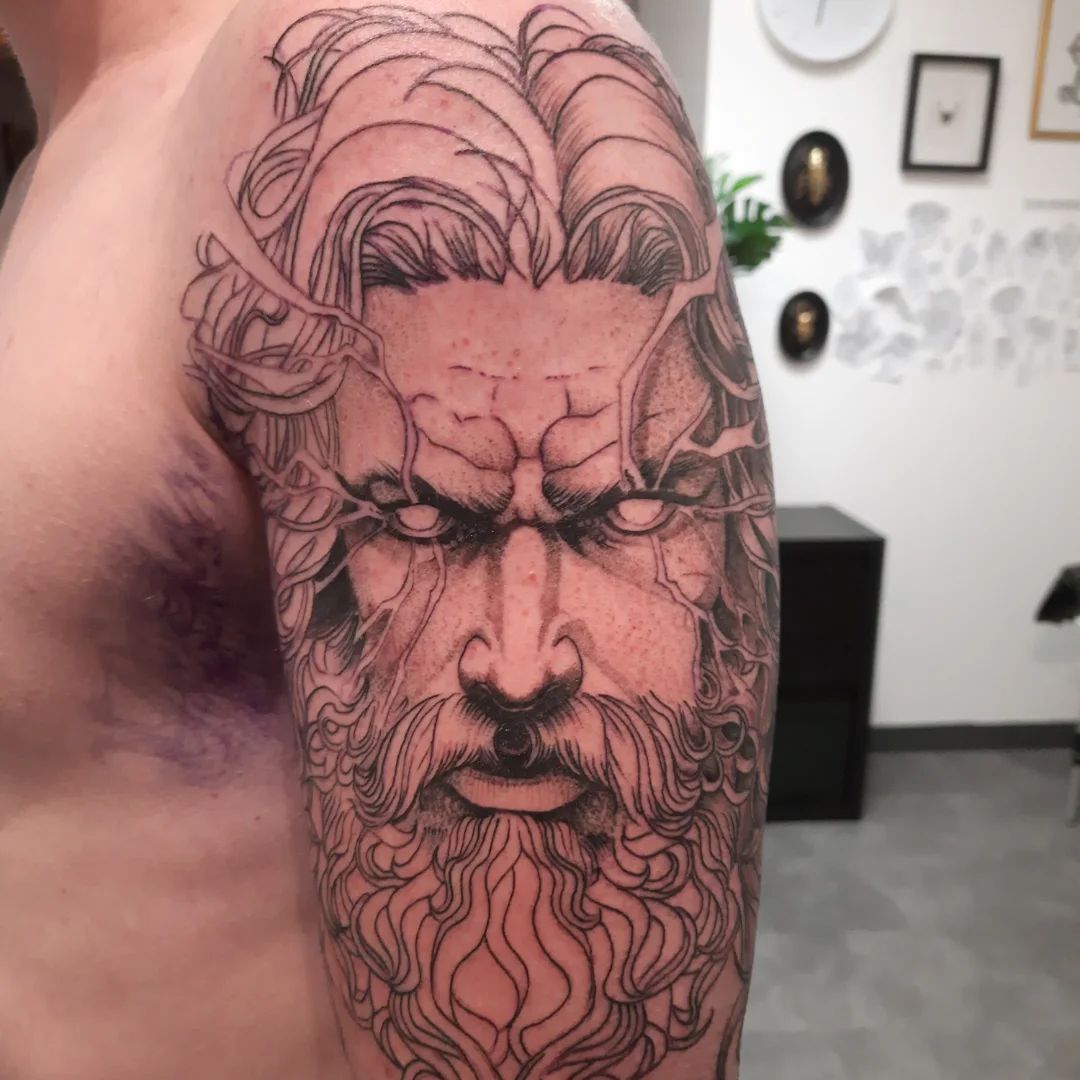 Tatouage par Erik Barrabes