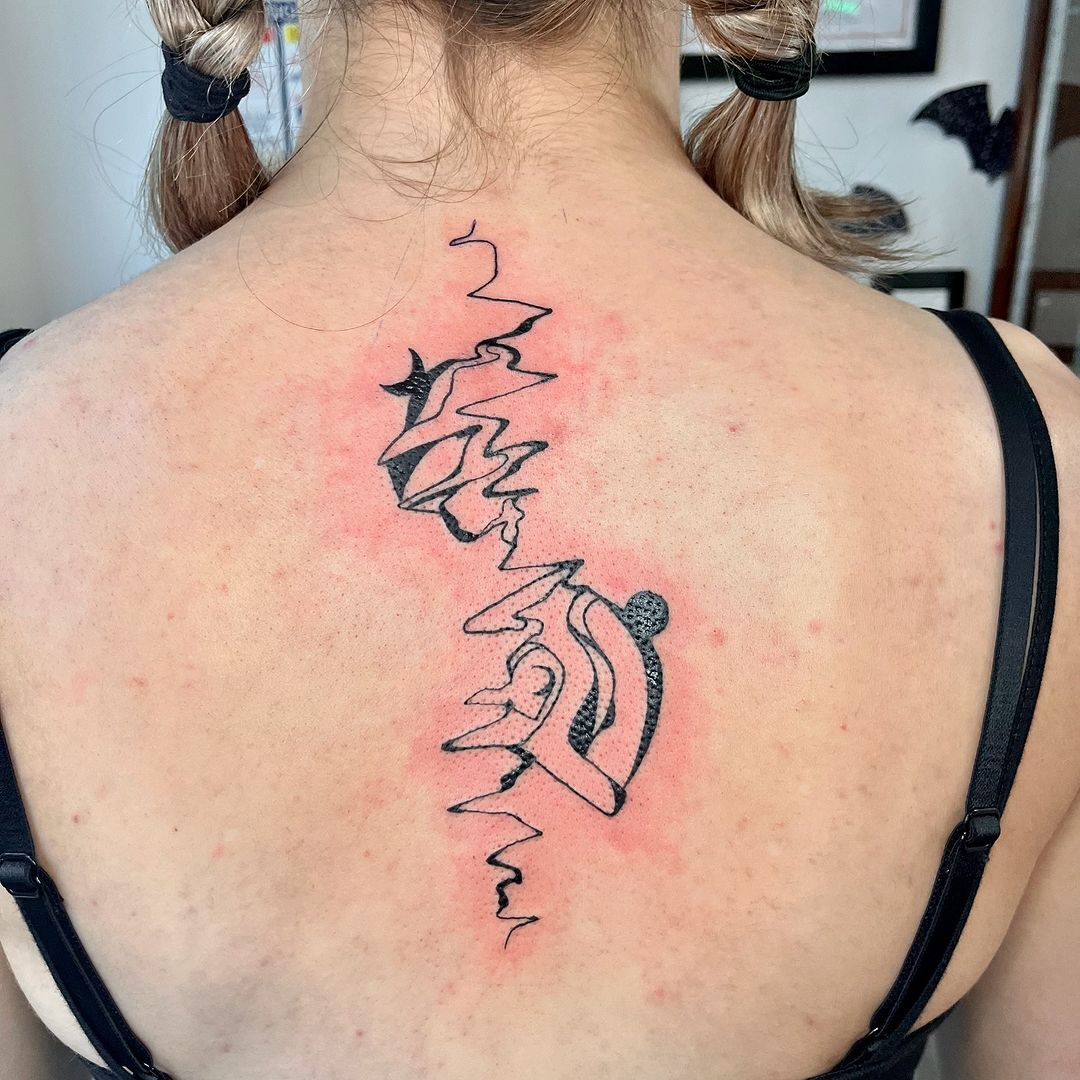 Tatouage par D I X I Le Vagabond
