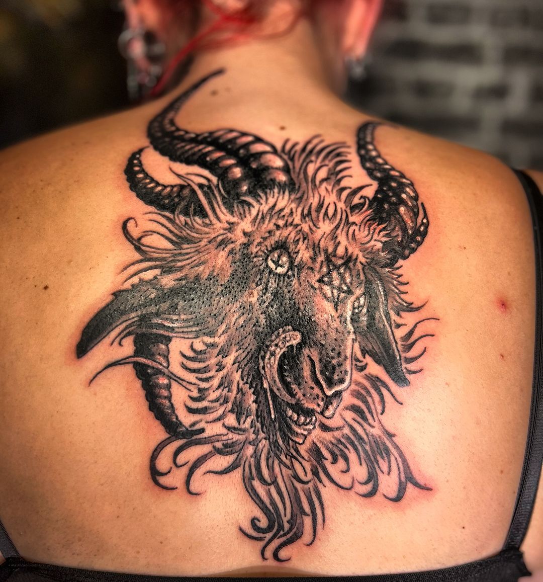 Tatouage par Razkas