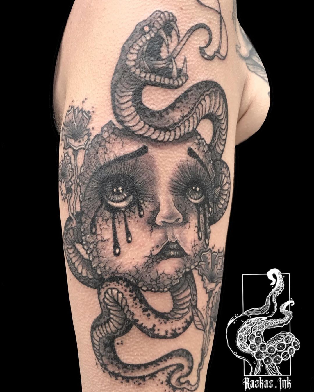 Tatouage par Razkas
