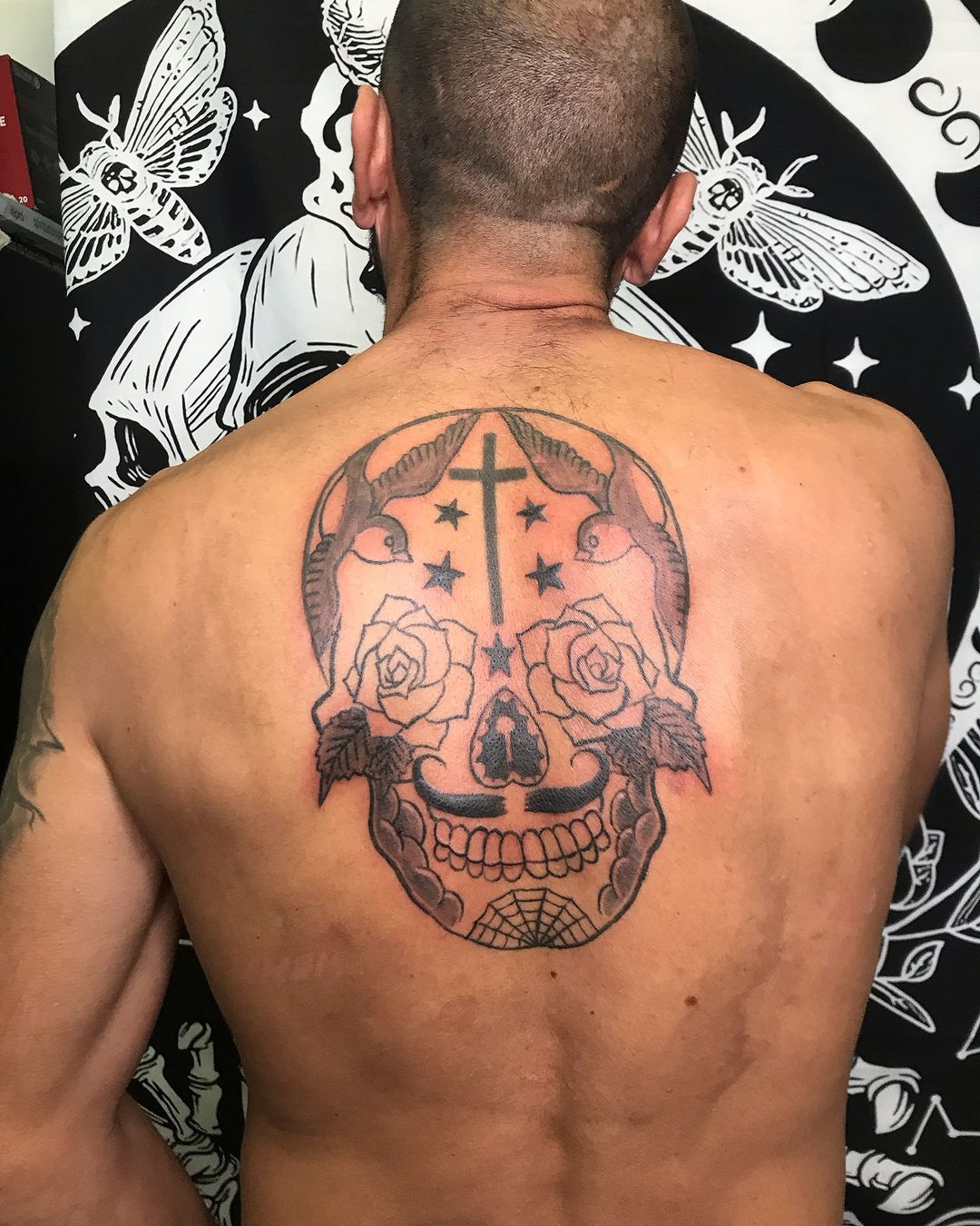 Tatouage par La Guêpe
