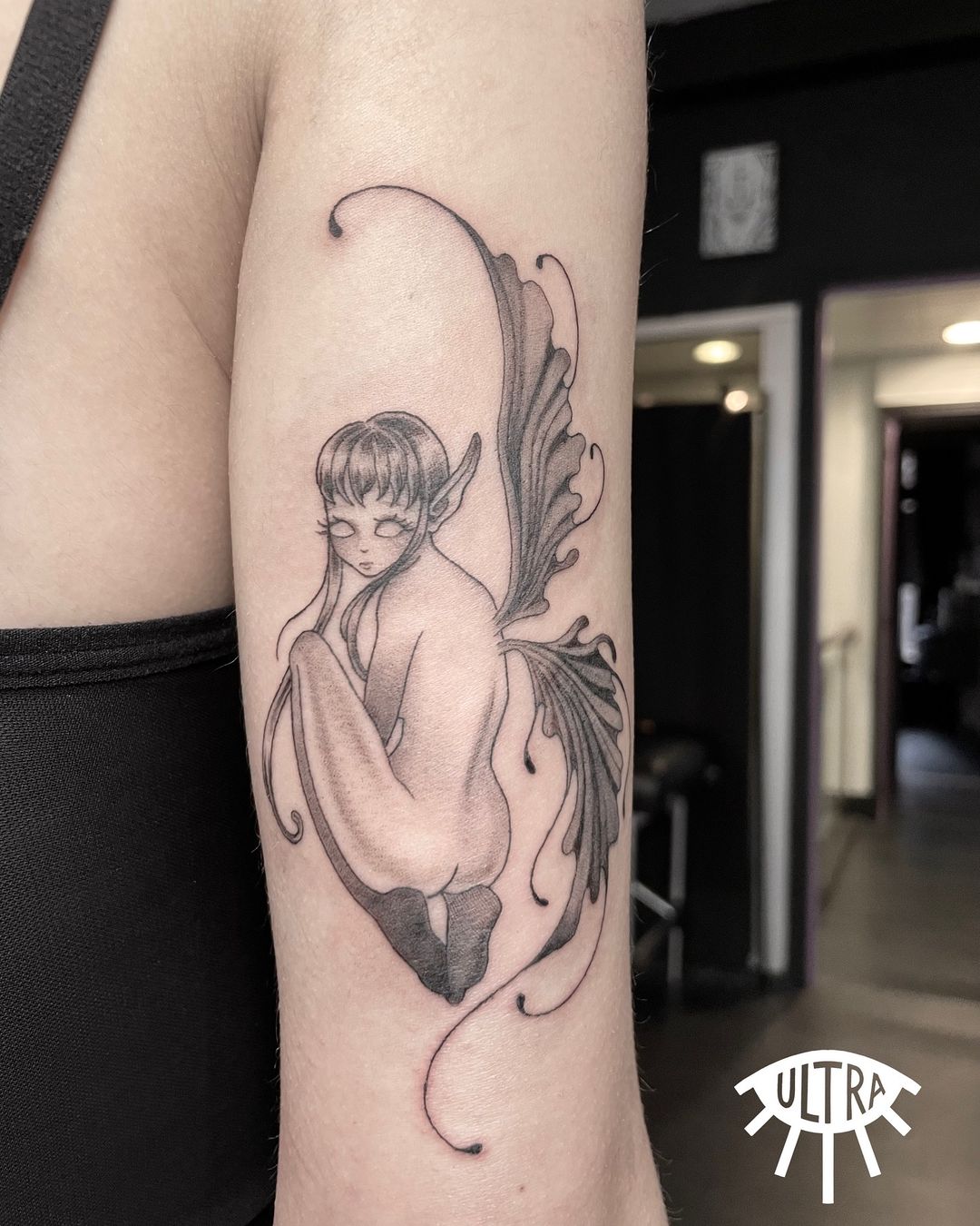 Tatouage par Ultraviolette Tattoo