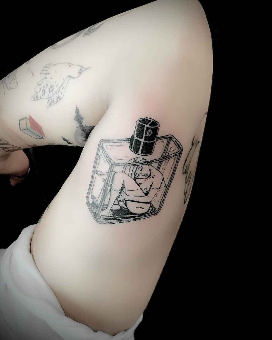 Tatouage par Tattooist JK