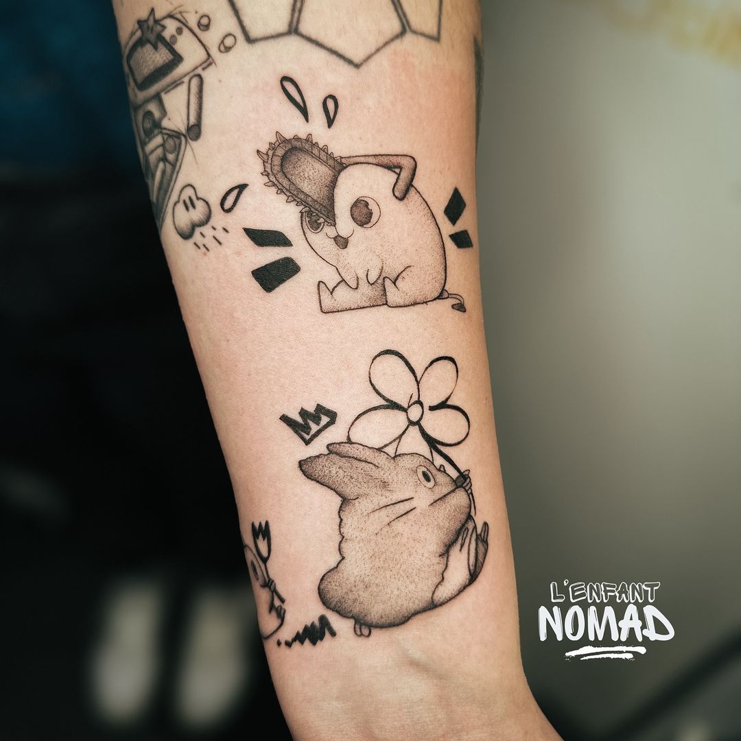 Tatouage par l'Enfant Nomad