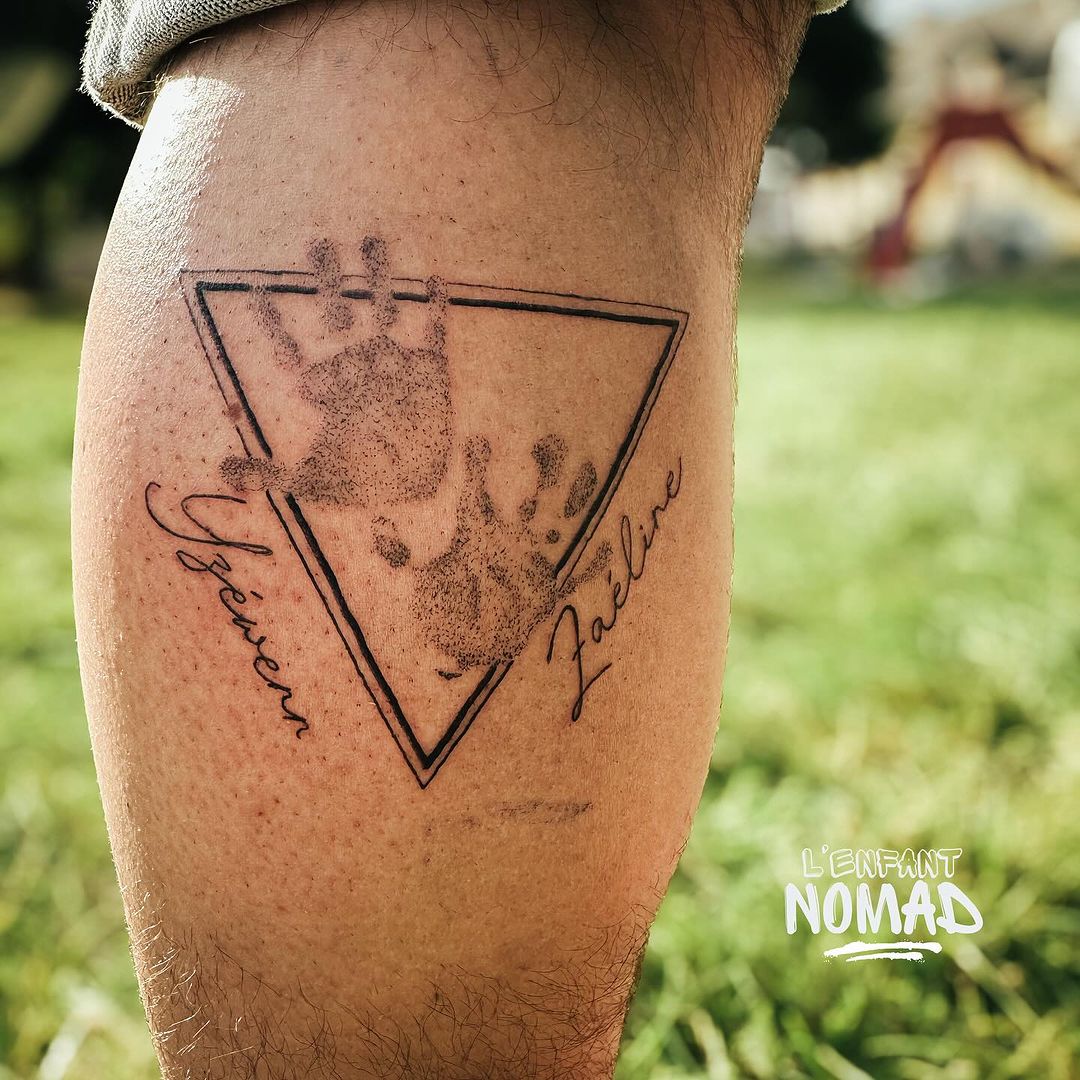 Tatouage par l'Enfant Nomad