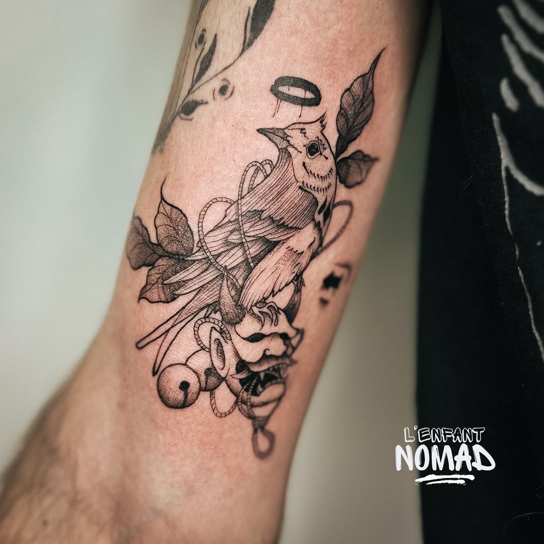 Tatouage par l'Enfant Nomad