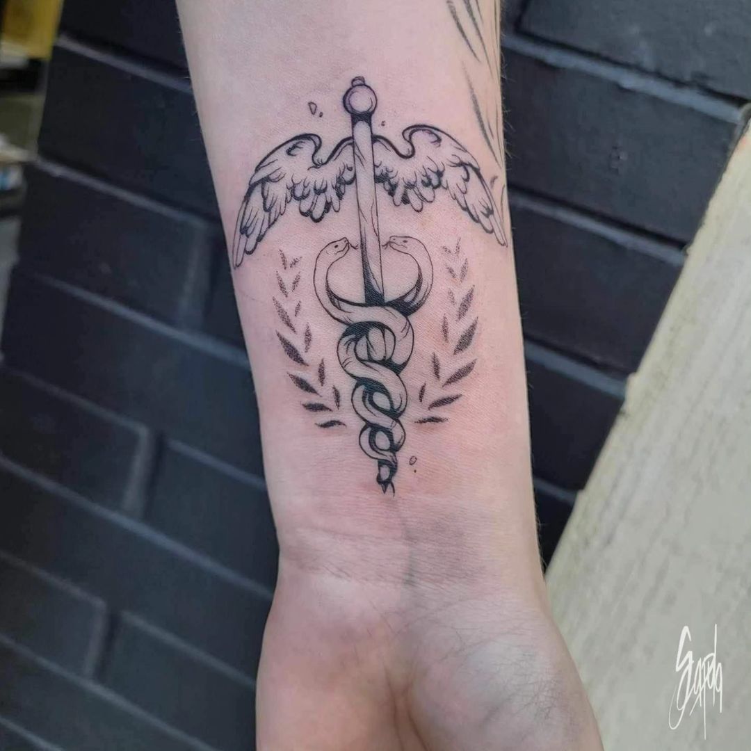 Tatouage par Scapula