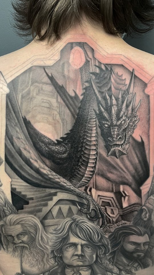 Tatouage par Ʇןnɐqıɥʇ