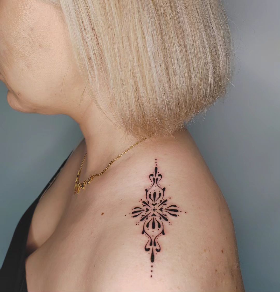 Tatouage par Ǝuıɥdǝ Sos